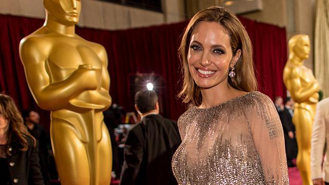 Angelina Jolie's First Oscars Dress Was The Epitome Of 80s