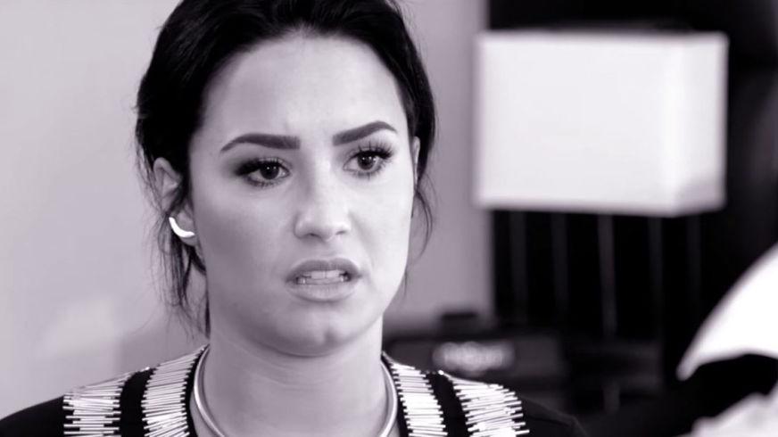 Demi Lovato opens up about her "abusive" father