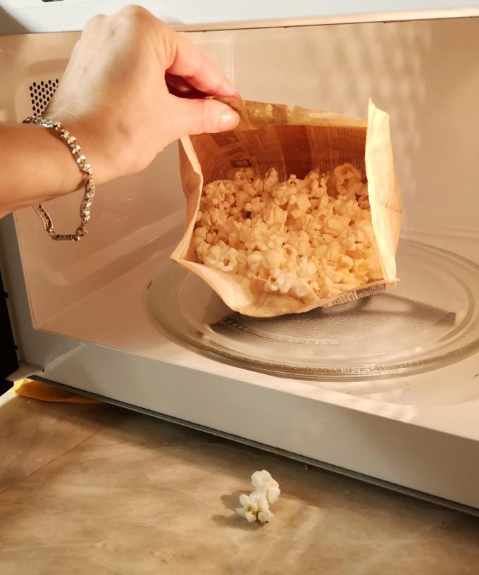 We've Been Heating Up Microwave Popcorn Wrong This Whole Time