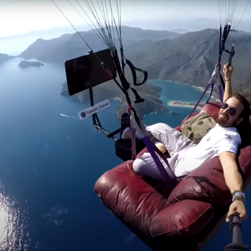 Man Flies His Entire Lounge Room Over The Ocean Because...Why Not?