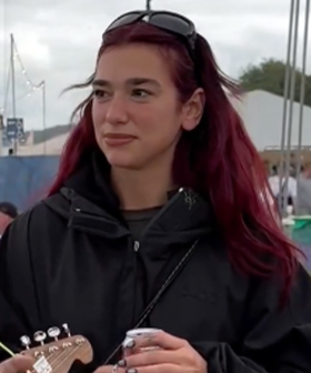 Dua Lipa Has An Awkward Run In With A Fan At Glastonbury